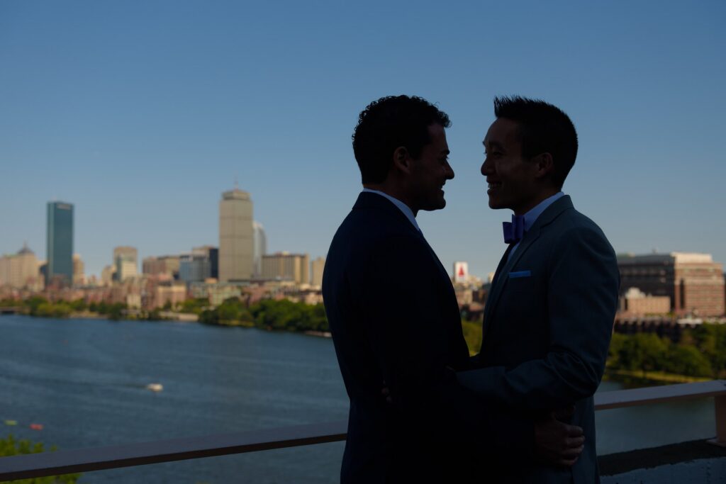 gay couple Boston skyline