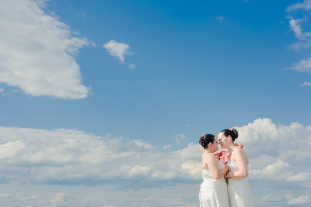 lesbian wedding summer blue sky