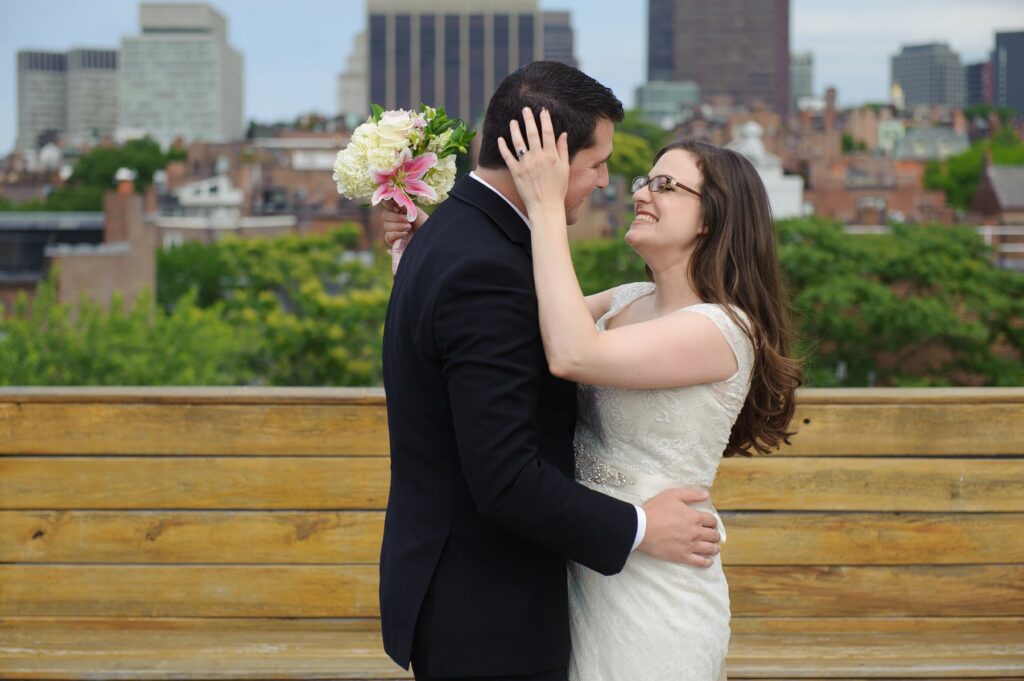 wedding on rooftop Boston skyline