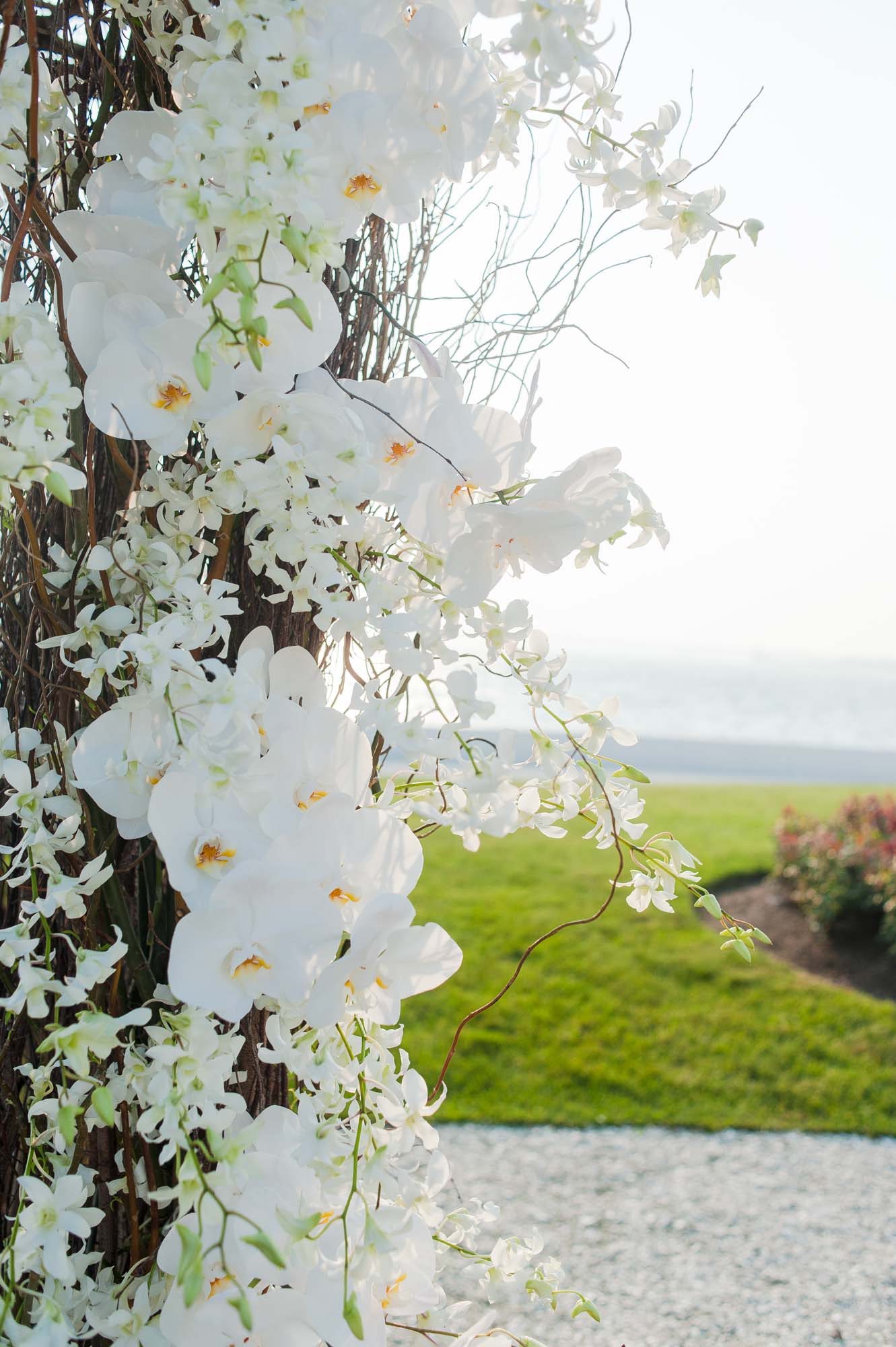 Belle Mer Wedding Venue Outdoor Ceremony Waterfront Floral Arch