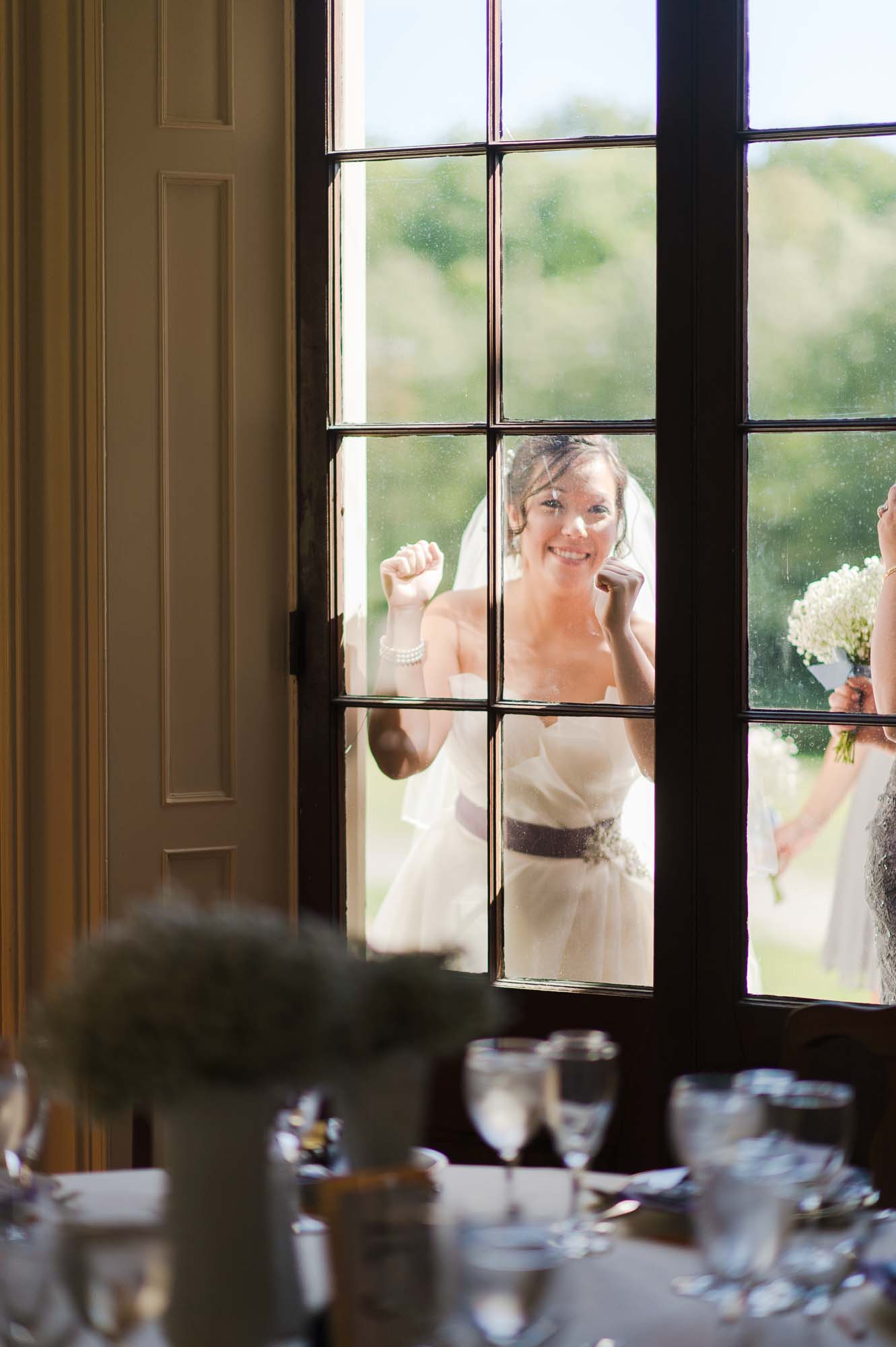 Bride Peeking Through Window At Lyman Estate