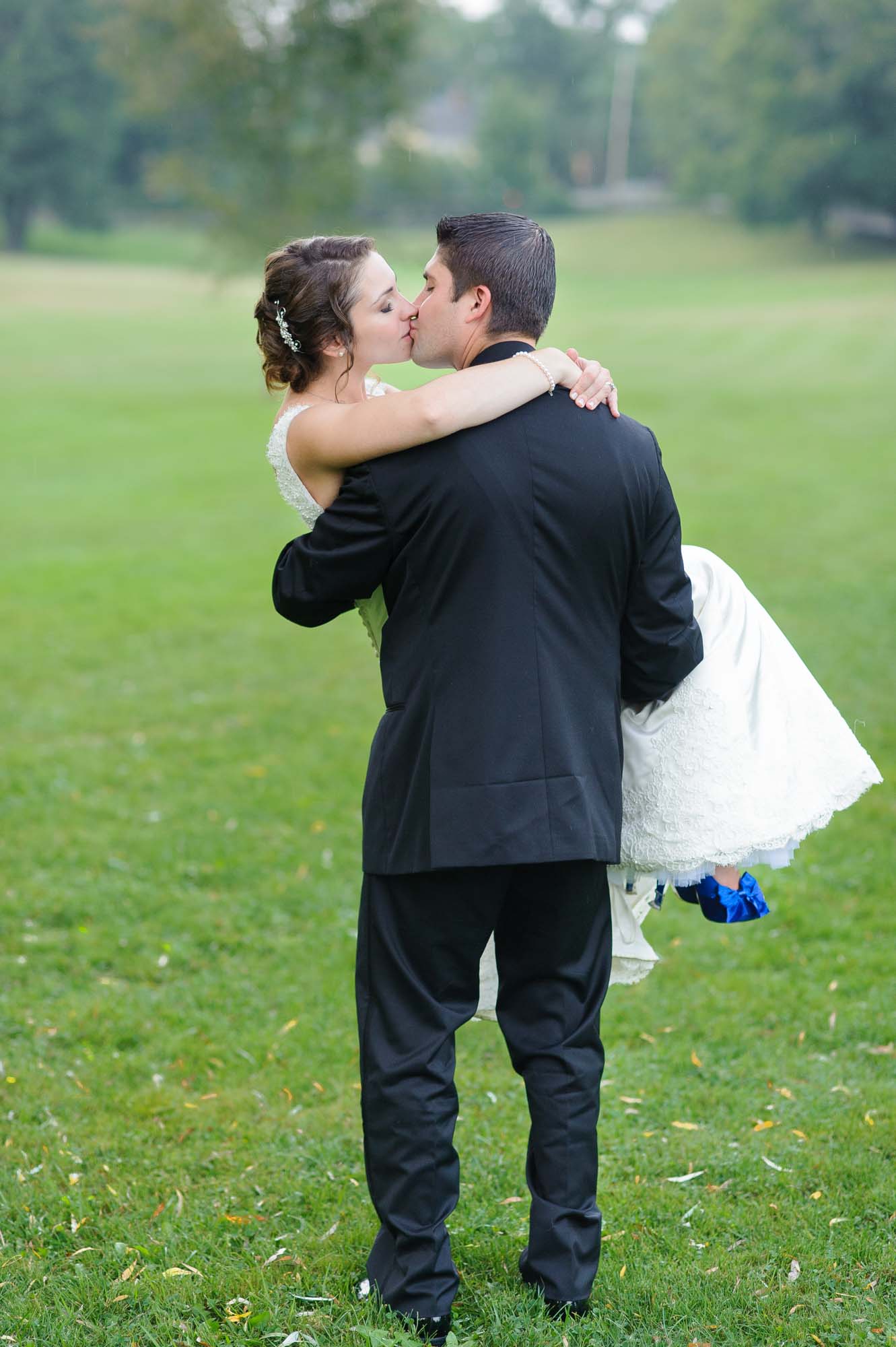 Groom Carrying Bride Pierce House