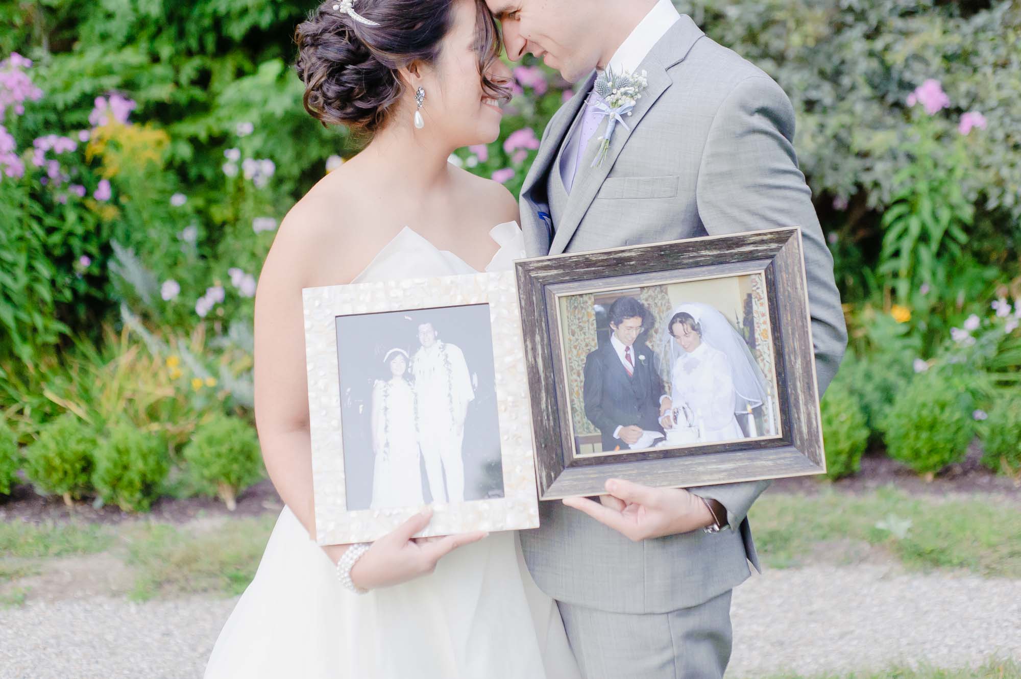 Lyman Estate Wedding Bride Groom Holding Pictures