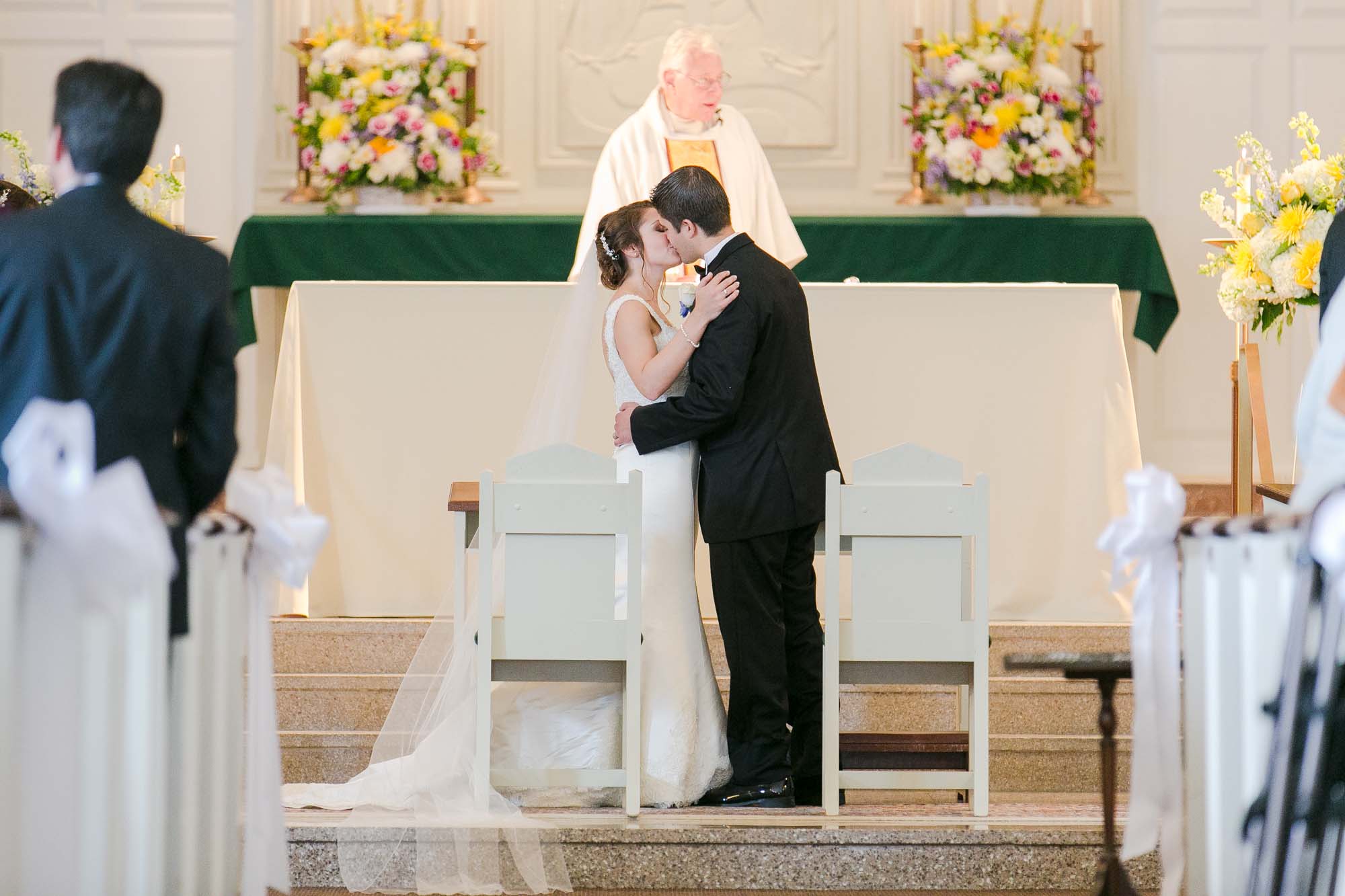 St. Brigid Parish Lexington MA Wedding Ceremony Bride Groom Kiss